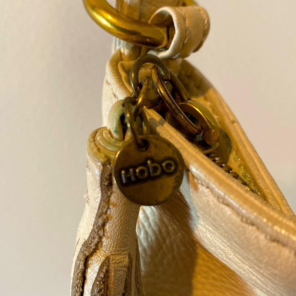 Lightly used Ivory Leather Hobo bag